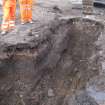 Building 6. Foundation trench. Made ground overlying humic soil at NE corner, facing SW