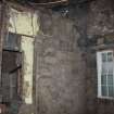 Rear elevation window and part of stairwell. Ground floor principal building 1, direction facing SE