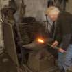Calum Macleod working at powered hammer