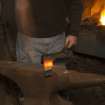 Hammering peat cutter head on anvil