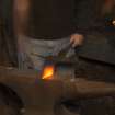 Hammering peat cutter head on anvil