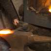 Hammering peat cutter head on anvil