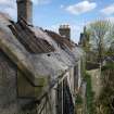 WB SE area. View along south exterior of nurses house facing ESE