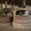 First floor. Grain hods and milling stones.