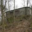 General view showing rounded wall of northen blockhouse, from north east.