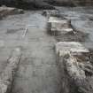 S facing shot of floor (020) at northern edge of excavation