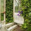 Detail of doorway and steps in greenhouse, Walled Garden, Housedale, Dunecht House.