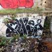 Example of graffiti on the walls (internal and external) of pump house standing on N side of graving dock no. 1.