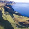 Oblique aerial view showing township and later sheep fank at Hallaig.