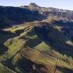 Oblique aerial view showing township and later sheep fank at Hallaig.