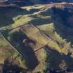 Oblique aerial view centred on the sheep fank and shepherd's house at Hallaig.