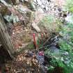 Stone edging at start of secondary lade - from SW - photograph from Standing Building Survey