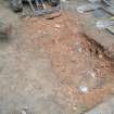 Ph1. Working shot of ground reduction beneath concrete slabs