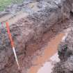 Watching brief, Wall footings [019] in trench section from NW, Marchmont House, Greenlaw