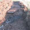 Archaeological evaluation, Trench 10 showing concrete from W, Olympic Rings, Dundonald, Ayrshire