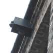 Historic building recording, N elevation, Detail of remains of winch block from NE, 24-26 West Harbour Road, Edinburgh