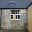 Historic building recording, North wing, Detail of window (converted from doorway) in the east side of the S elevation from SE, Braehead Mains, 603 Queensferry Road, Edinburgh