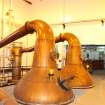 Historic building recording, Still House 2, General view of upper level showing the copper stills from S, Macallan Distillery