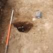 Archaeological Evaluation photograph, Lower Gauls Barrow, Context 0104, half-sectioned