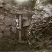 Photograph of entrance to steps in the wall at Hillhead Broch. 