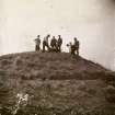 Photograph of a group of men working at Hillhead Broch. 
