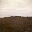 Photograph, distant view of a group of men working at Elsay Broch. 