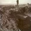 Photograph of men excavating at Elsay Broch. 
