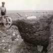 Photograph of men working at Kilminster Broch (mound).