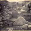 Photograph, Keiss broch, exterior view of entrance showing stone door in situ.