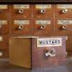 Coldstream, 61 High Street. Interior. Pharmacists medicine drawer. Detail showing 'MUSTARD' drawer label (painted and gilded glass).