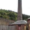 View from north showing chimney in rear courtyard of Ravenscraig Hospital, Greenock. 