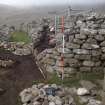 Watching brief, Record shot of blackhouse after clearance of rubble, limit of excavation, along profile from E-W, Repairs to S Wall and Gable, Blackhouse G, St Kilda