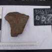 Watching brief, Finds 17, Rotary quern fragments 002, Repairs to S Wall and Gable, Blackhouse G, St Kilda
