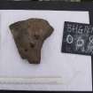 Watching brief, Finds 18, Rotary quern fragments 002, Repairs to S Wall and Gable, Blackhouse G, St Kilda