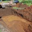 Watching brief photograph, The Snabs, Working shot, excavation of soakaway track- sand deposit ctx 51 visible