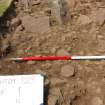 Excavation, Trench B, Small cairn material S side from N, Blasthill Chambered Tomb, 2009