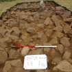 Excavation, Trench B, Cairn stones in situ from N, Blasthill Chambered Tomb, 2009