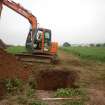 Watching brief, Post excavation shot- Pole 99 from E, Greenburn Enclosure, Ayton
