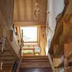 Interior view showing staircase leading from ground-floor extension room in house at The Steading, Nether Blainslie.