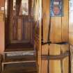 Interior view showing detail of cupboard doors in ground-floor entrance lobby of house at The Steading, Nether Blainslie.