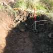 Archaeological evaluation, Trench 4, cut for rubble soakaway 003, Allanbank, Duns, Scottish Borders