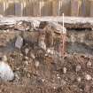 Watching brief, Post holding in the rubble against washed away clay, Cullochy Combing Weir, Caledonian Canal, Highland