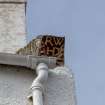 Craill, Customs House, northeast skewput with initials R W (for Robert Wood) and H D with crossed palm leaves. 