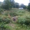 Archaeological evaluation, Structure 2- showing location of slot in E wall, Aberchalder Burn and Allt A'Choire