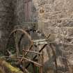 View of meal mill waterwheel ('start and awe' type) remains (frame survives, paddles lost) from north east