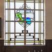 Interior. Detail of stain glass window in The Boardroom.