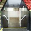 Interior. General view of steps down to the corridor in the main stand.