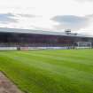 General view of the football pitch to the east covered terracing taken from the north west.