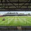 General view of the football pitch to the west covered terracing taken from the east covered terracing.