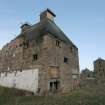 Historic building survey, S and W-facing elevations with a former distillery
building in the distance, Pathbrae Maltings Building, Kirkliston